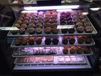 Bakes goods inside deli counter